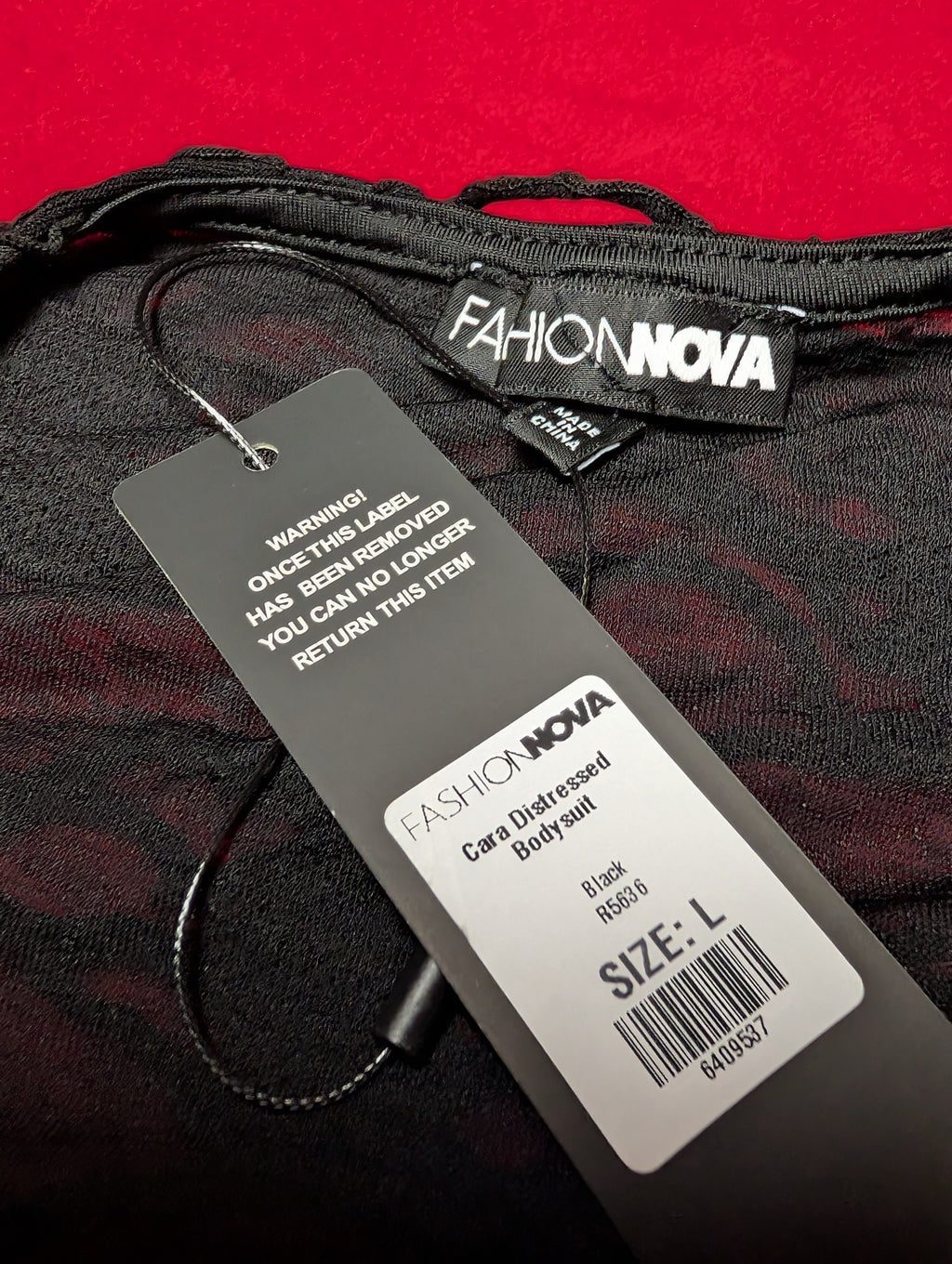 Fashion Nova Black Cara Distressed Tee Bodysuit in Large