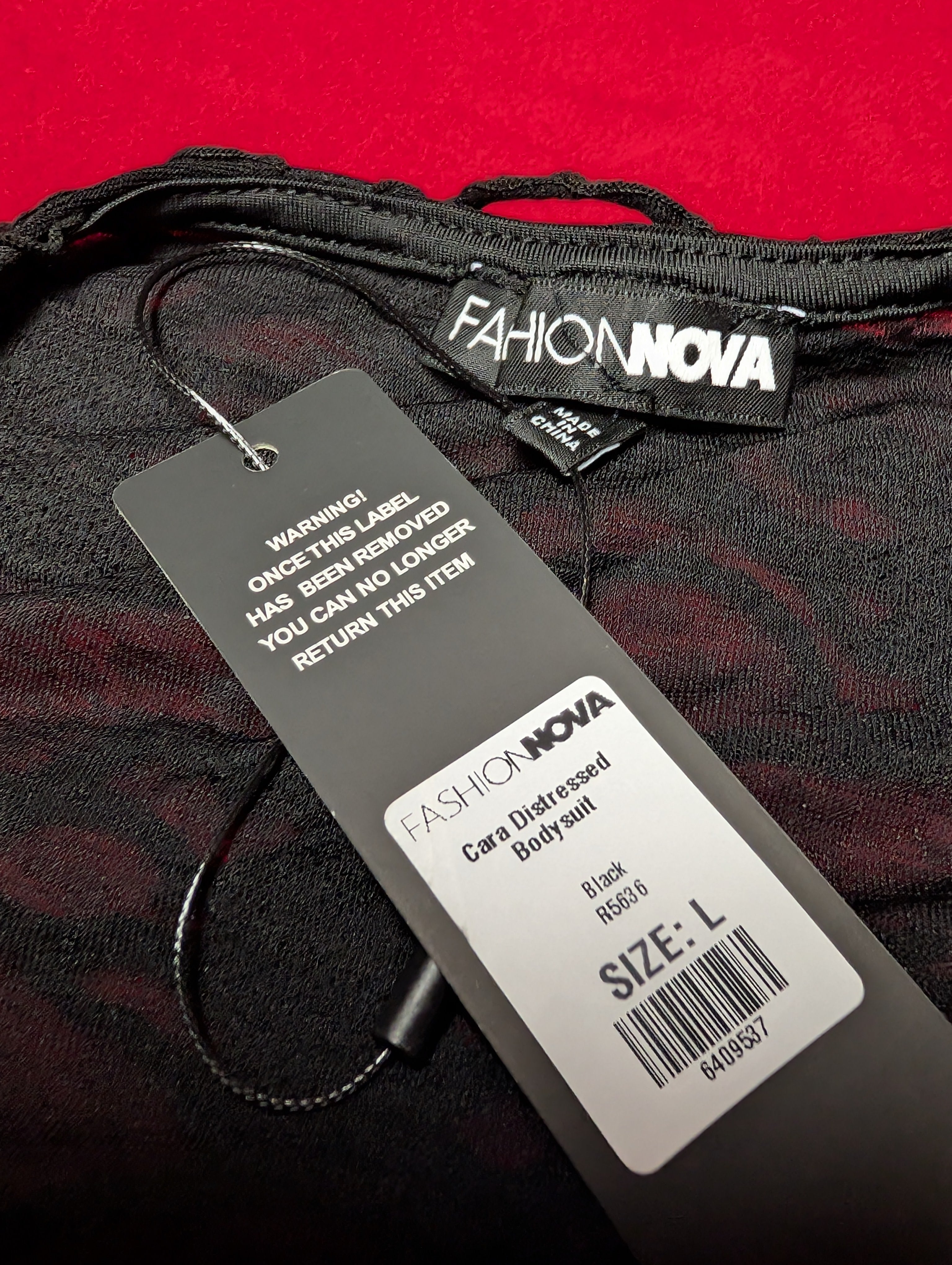 Fashion Nova Black Cara Distressed Tee Bodysuit in Large